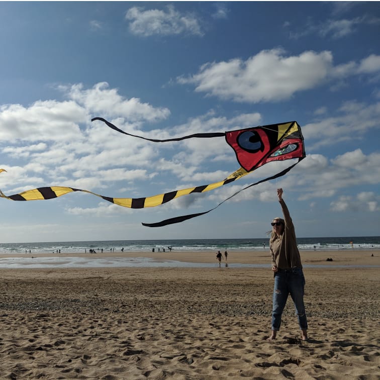 Jen flying a kite